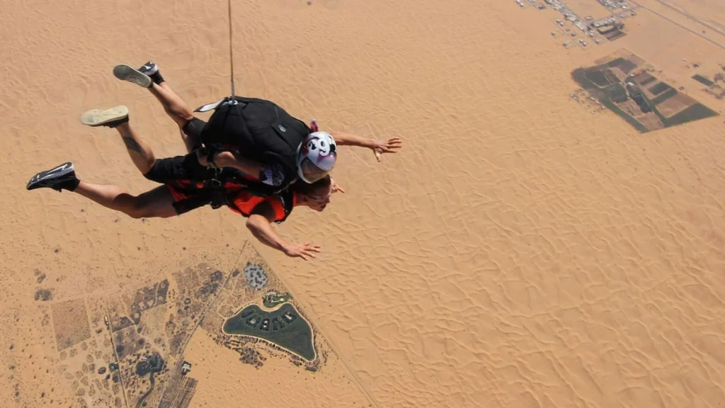 Desert skydiving in Dubai above golden dunes and vast Arabian landscape
